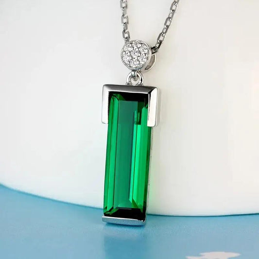 Emerald Pendant Necklace on a white background