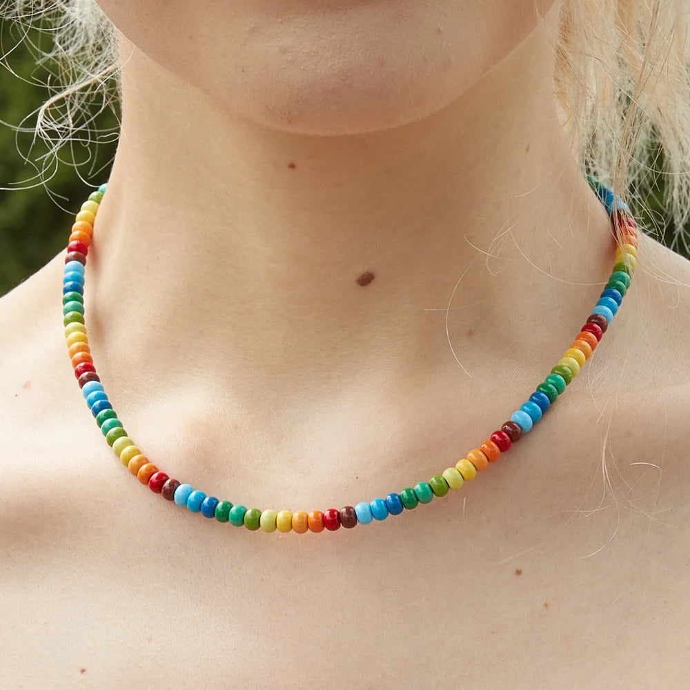 Person Wearing Rainbow Bead Necklace